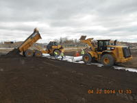 April 2014 - Contractor places soil over white geotextile fabric on Jersey City property