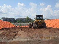 August 2015 - Covering geotextile with screened clean fill at Kellogg Street properties