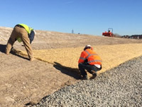 December 2016 - Placing erosion control matting on the south slope of the SA6 North open space area