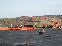 September 2015 - Placing orange geotextile in open space
